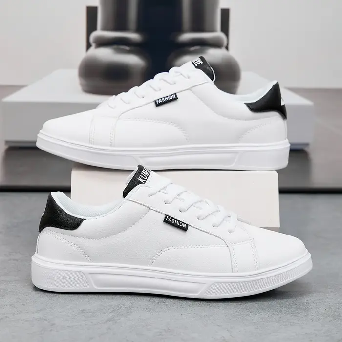 Blanc noir hommes chaussures confortables chaussures de Skateboard décontractées hommes solide loisi
