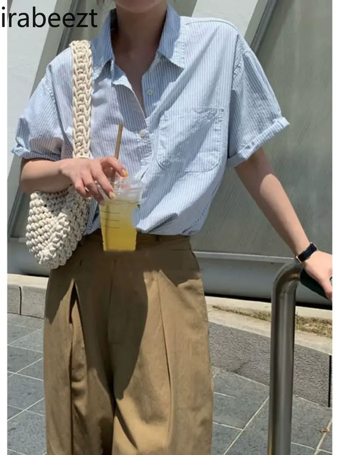 Chemise à rayures bleues manches courtes femmes été 2025 nouveau col Polo