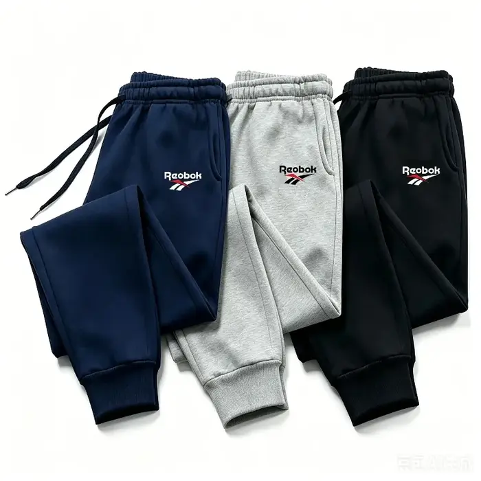 Pantalon de jogging décontracté pour homme, taille élastique avec cordon de serrage, poches latérales, coupe fuselée, chevilles resserrées, idéal pour la gym, la course et le fitness