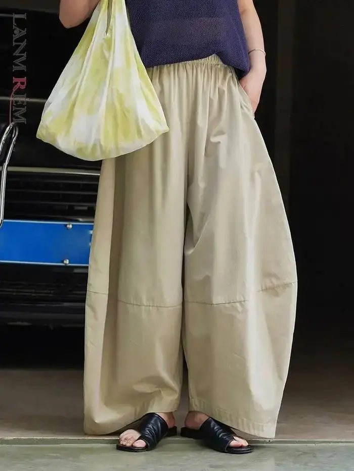 [LANMREM] Streetwear épissé pantalon à jambes larges pour les femmes solide taille haute
