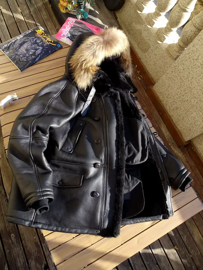Veste d'hiver noire à capuche en peau de mouton pour homme