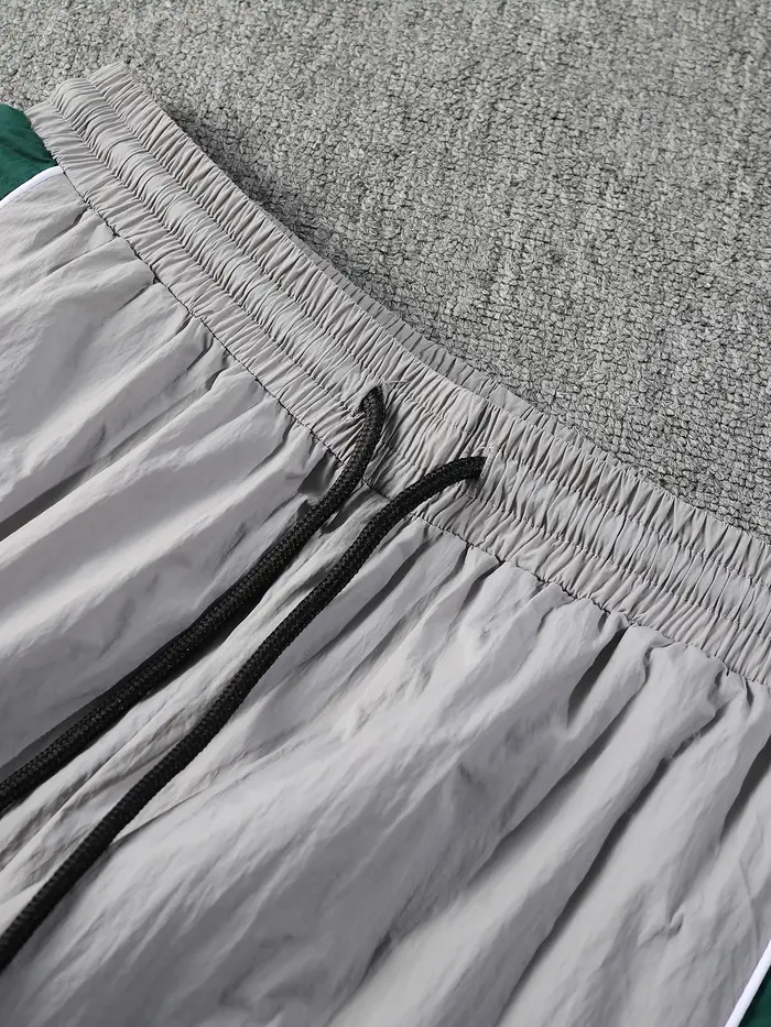 Pantalon de jogging gris-vert colorblock à rayures latérales pour homme